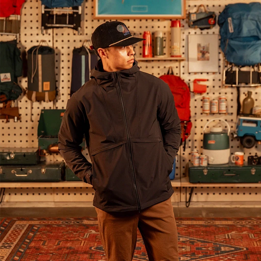 General front view of model wearing HighPeak Jacket in 'Black'