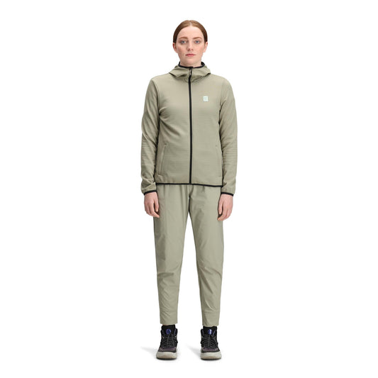 General front model shot of Topo Designs Global Midlayer Hoodie - Women's in "Dried Sage"