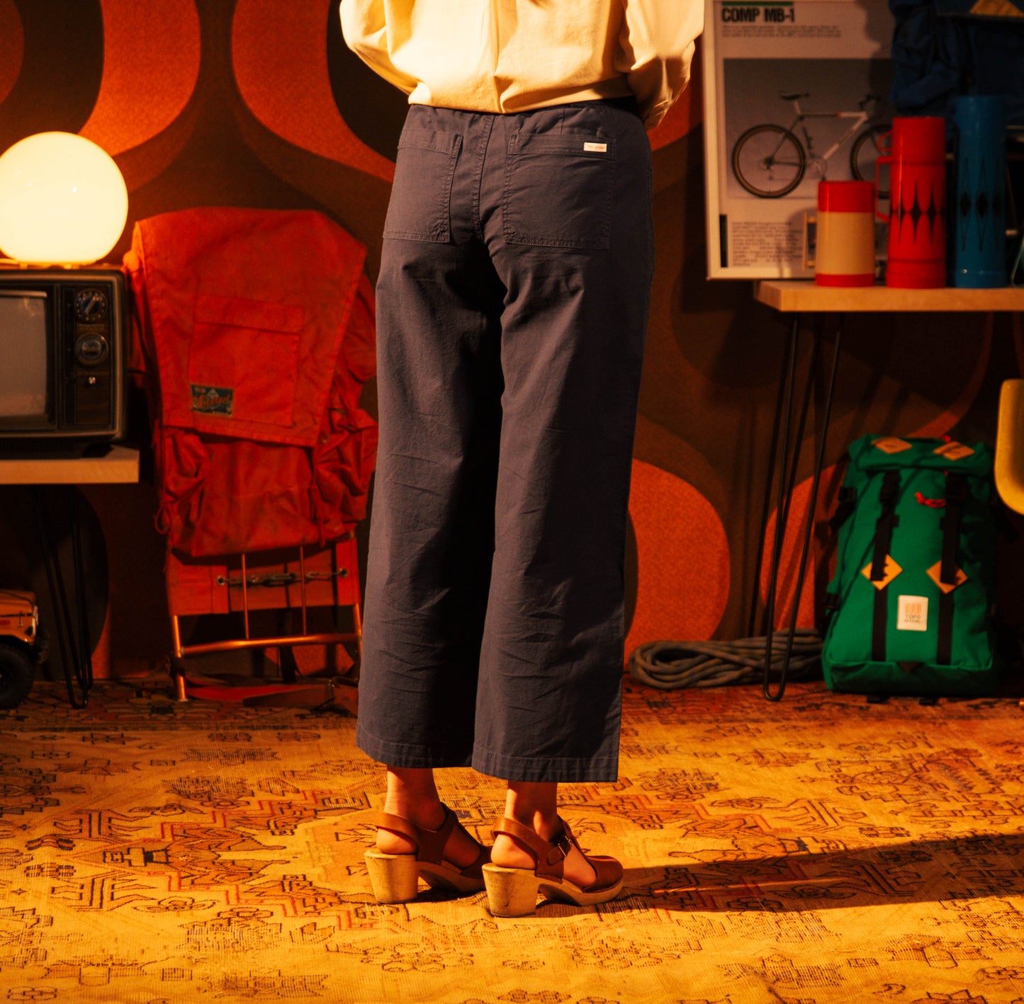 General lifestyle shot of Topo Designs Desert Wide Leg Pants - Women's in "Black"