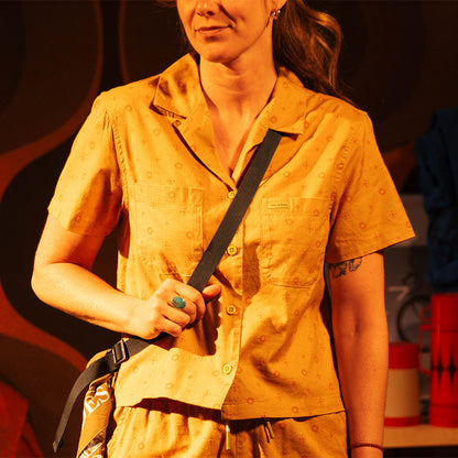 General front view of Topo Designs Daytripper Short Sleeve - Women's in "Tossed Motif Goldenrod"