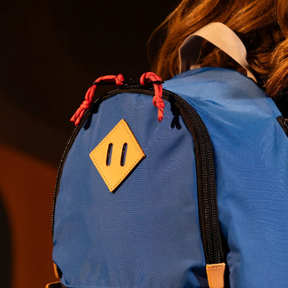 General model view detail image of the Topo Designs Classic Teardrop Backpack in "Classic Blue".
