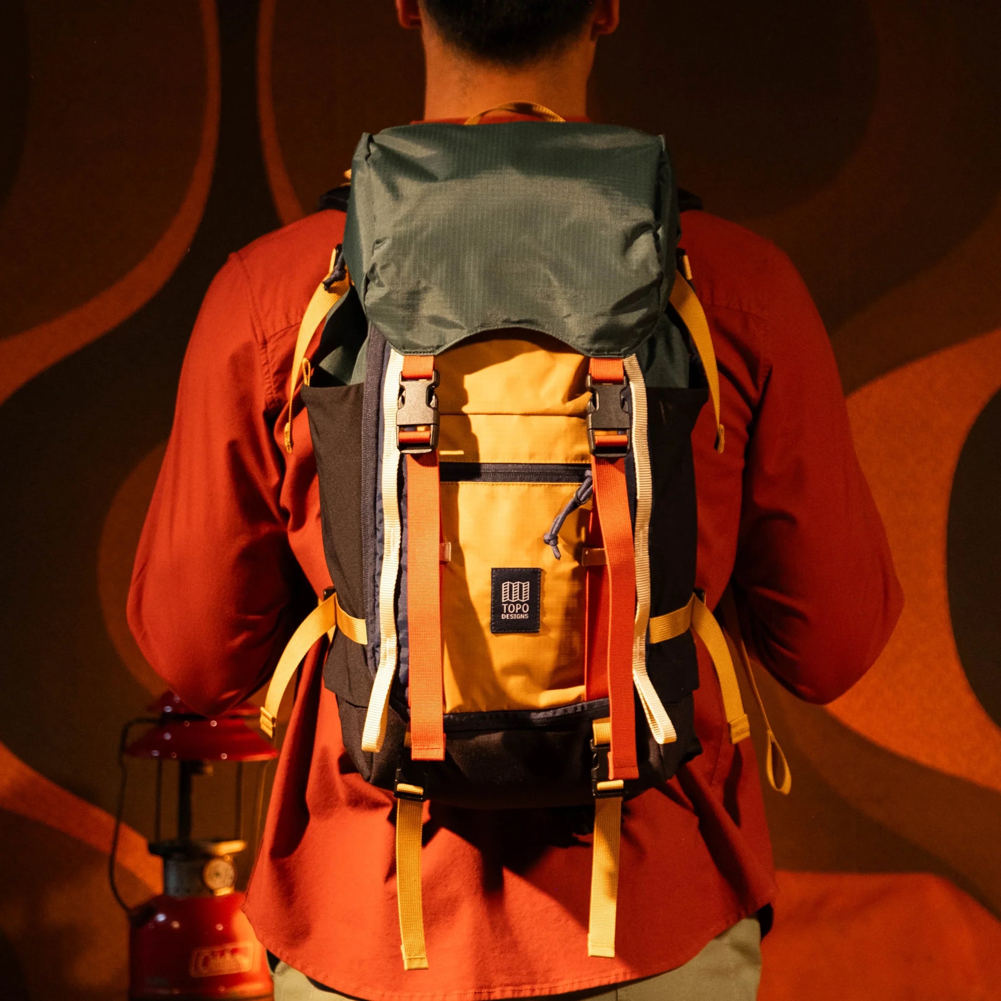 General lookbook on model photo of Rover Trail Pack in "Forest / Goldenrod"