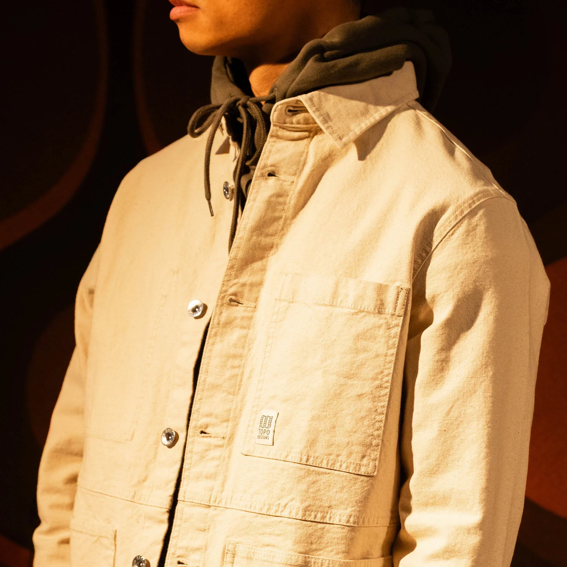 General model shot of Front view of Topo Designs Utility Jacket Undyed - Men's in "Undyed"