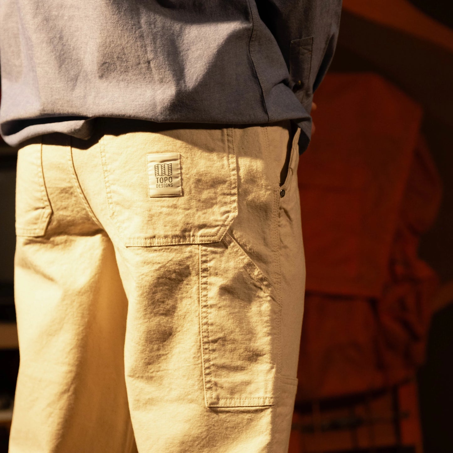 General model shot of Topo Designs Utility Pants Undyed - Men's in "Undyed"