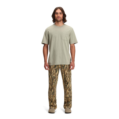 General front model shot of Topo Designs Dirt Pocket Tee - Men's in "Dried Sage"