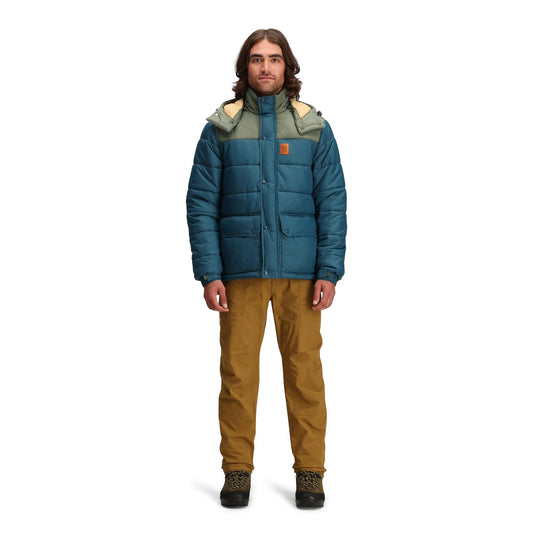 General front model shot of Topo Designs Retro Ridge Puffer Jacket - Men's in "Pond Blue / Beetle"