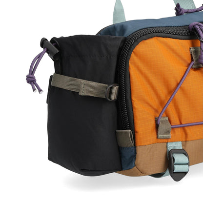 General Detail shot of Topo Designs Mountain Hydro Hip Pack in "Pond Blue / Spice"