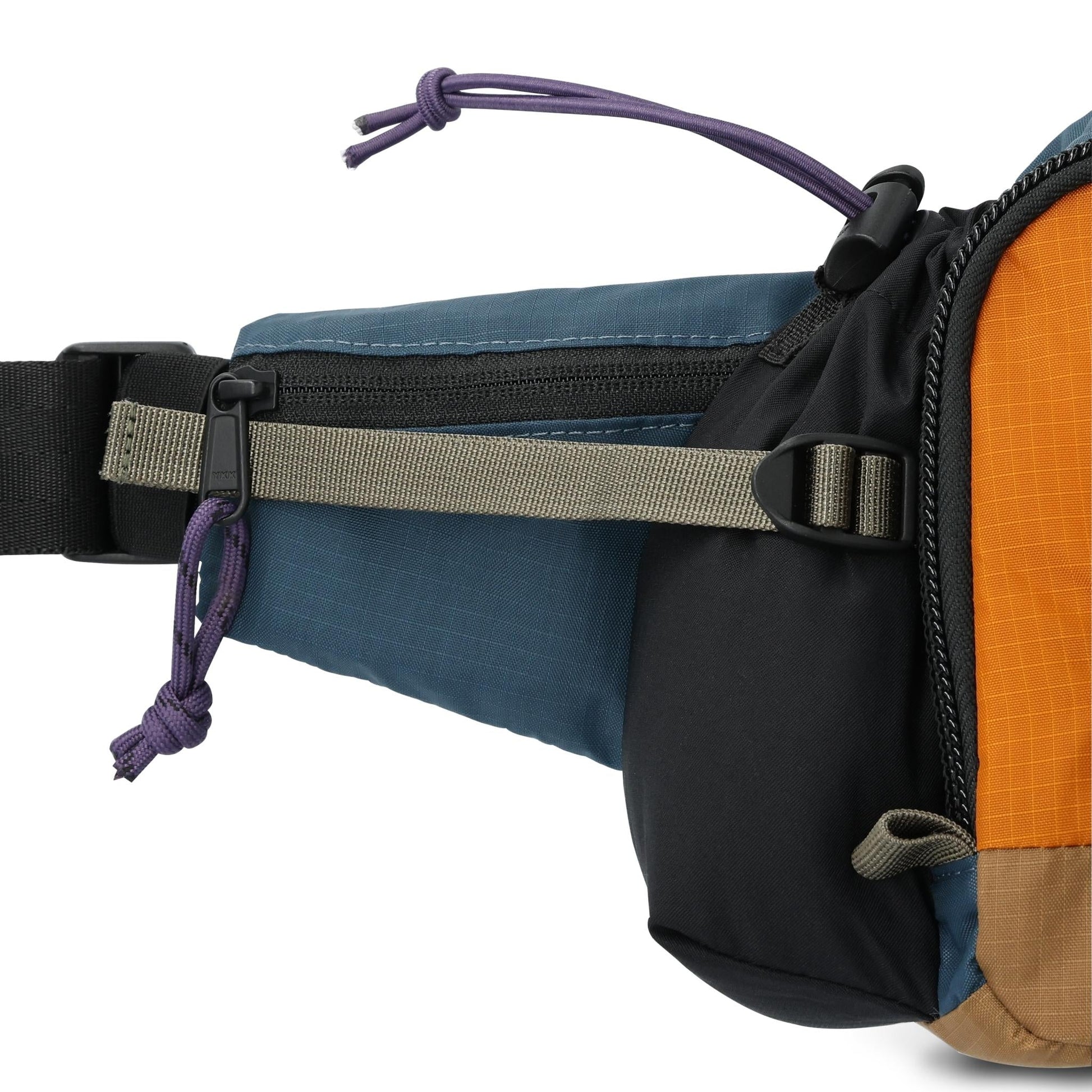 General Detail shot of Topo Designs Mountain Hydro Hip Pack in "Pond Blue / Spice"