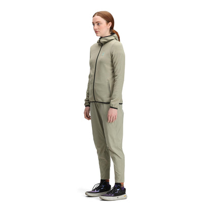 General side model shot of Topo Designs Global Midlayer Hoodie - Women's in "Dried Sage"