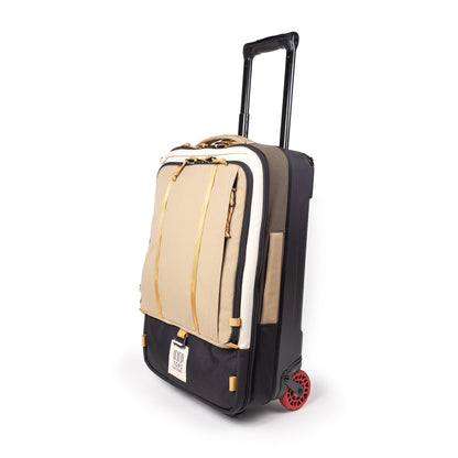 Image of telescoping collapsible handle on Topo Designs Global Travel Bag Roller durable carry-on convertible laptop backpack rolling suitcase in "Elmwood / Woodland".