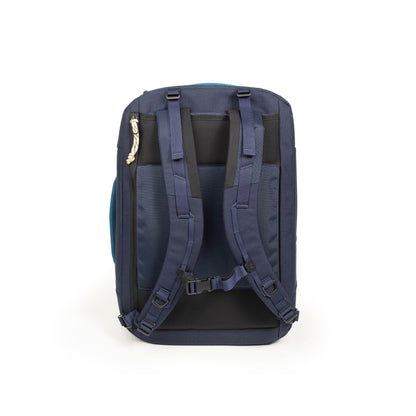 Back view of Global Travel Duffel in "Navy / Sahara" with shoulder straps shown.
