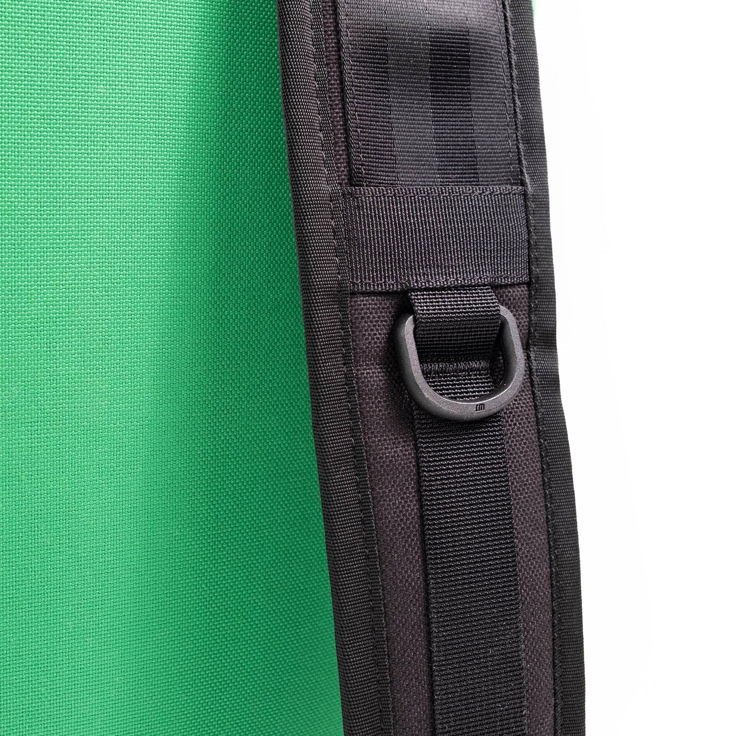 General detail image of strap hooks on the straps on the back of the Topo Designs Klettersack Classic vintage-inspired rucksack backpack in "Alpine Meadow".