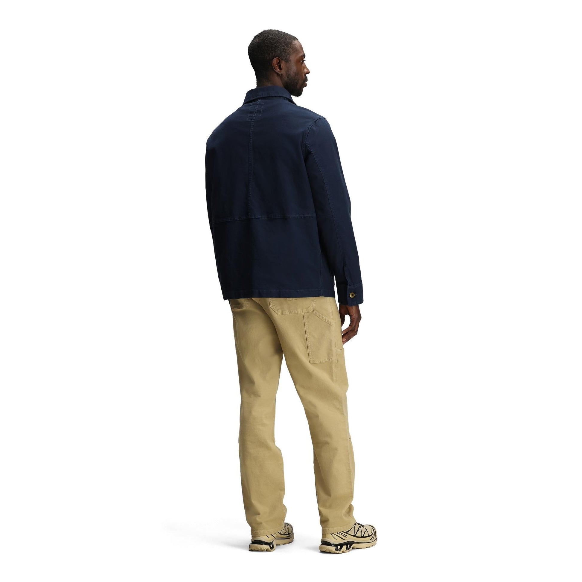 General back model shot of Topo Designs Utility Jacket - Men's in "Midnight"