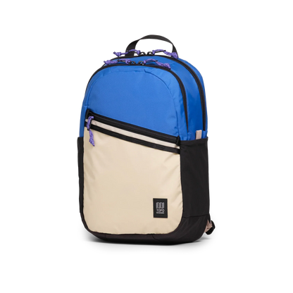 Front Quarter View of Topo Designs Commuter Backpack in "Classic Blue / Bone White"