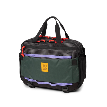 Quarter View of Topo Designs Mountain Cross Bag in "Grid / Very Peri"