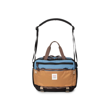 Front View of Topo Designs Mountain Cross Bag in "River Blue / Brown Oak"