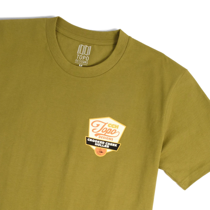 Front detail shot of Topo Designs x CCH x Pine Printshop Golden Trout Tee in "Moss"