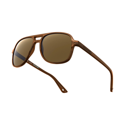 General alternate angled view of VALLON X Topo Designs sunglasses in "Brown / Brown" with sunglass arms open.