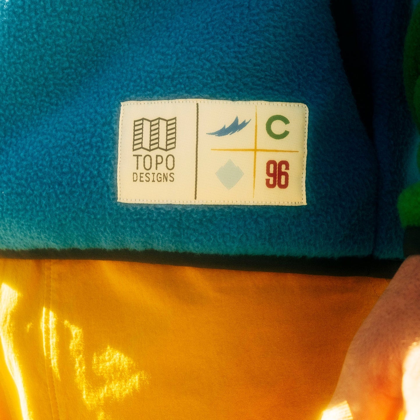General lifestyle shot of Topo Designs x Colorado Rapids Vista 1/4 Zip Fleece