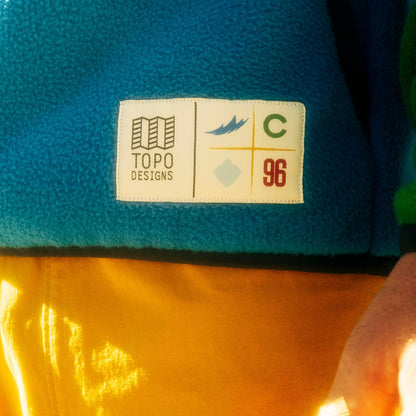 General lifestyle shot of Topo Designs x Colorado Rapids Vista 1/4 Zip Fleece
