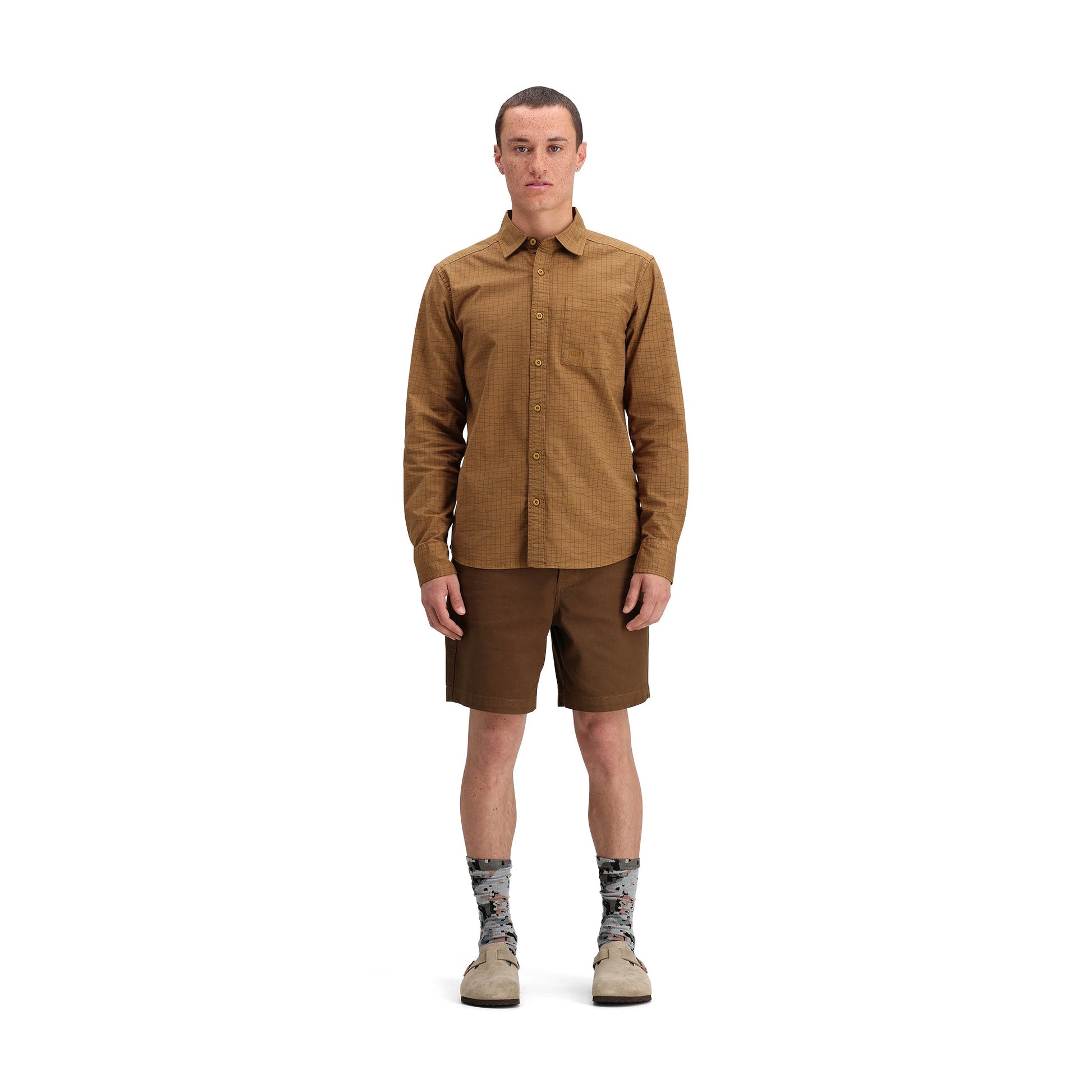 General front model shot of Topo Designs Dirt Desert Shirt - Men's in "Dark Khaki Terrain"