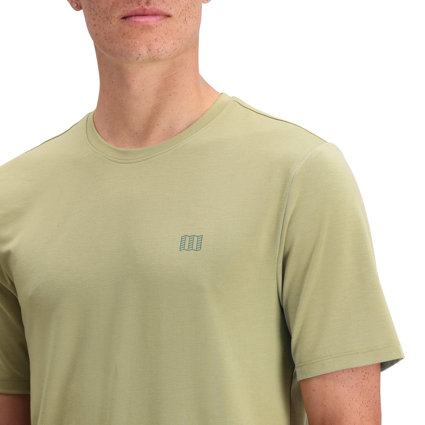 Detail shot of Topo Designs Global Tek Crew Ss - Men's in "Moss"