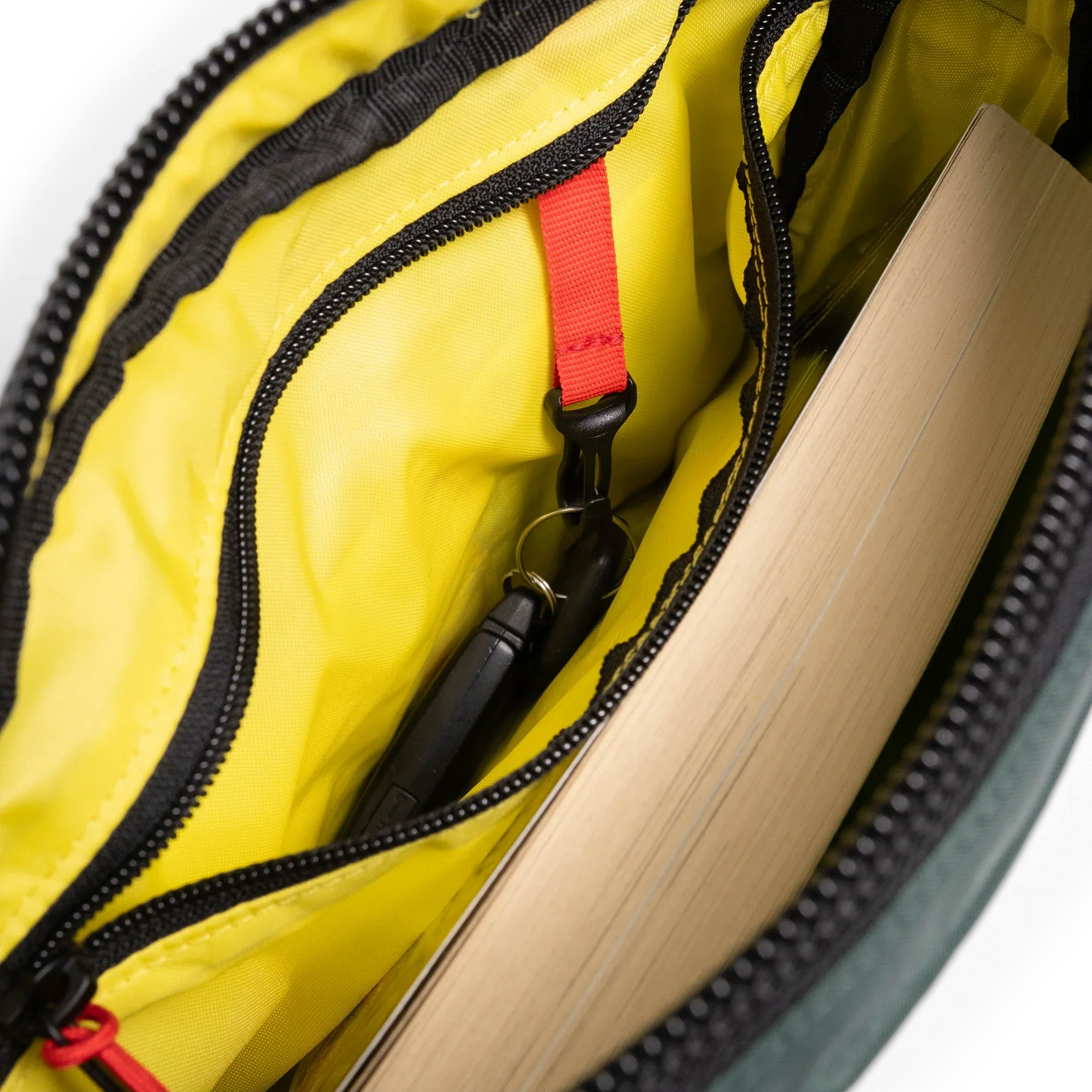 General interior view of Topo Designs Block Bag in "Forest / Bone White"