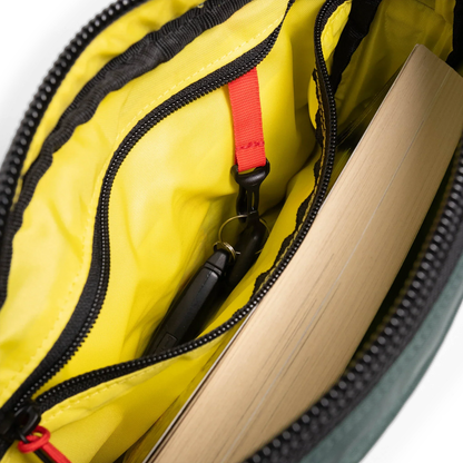 General interior view of Topo Designs Block Bag in "Forest / Bone White"