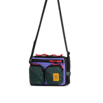 Front quarter view of Topo Designs Block Bag in "Very Peri / Forest"