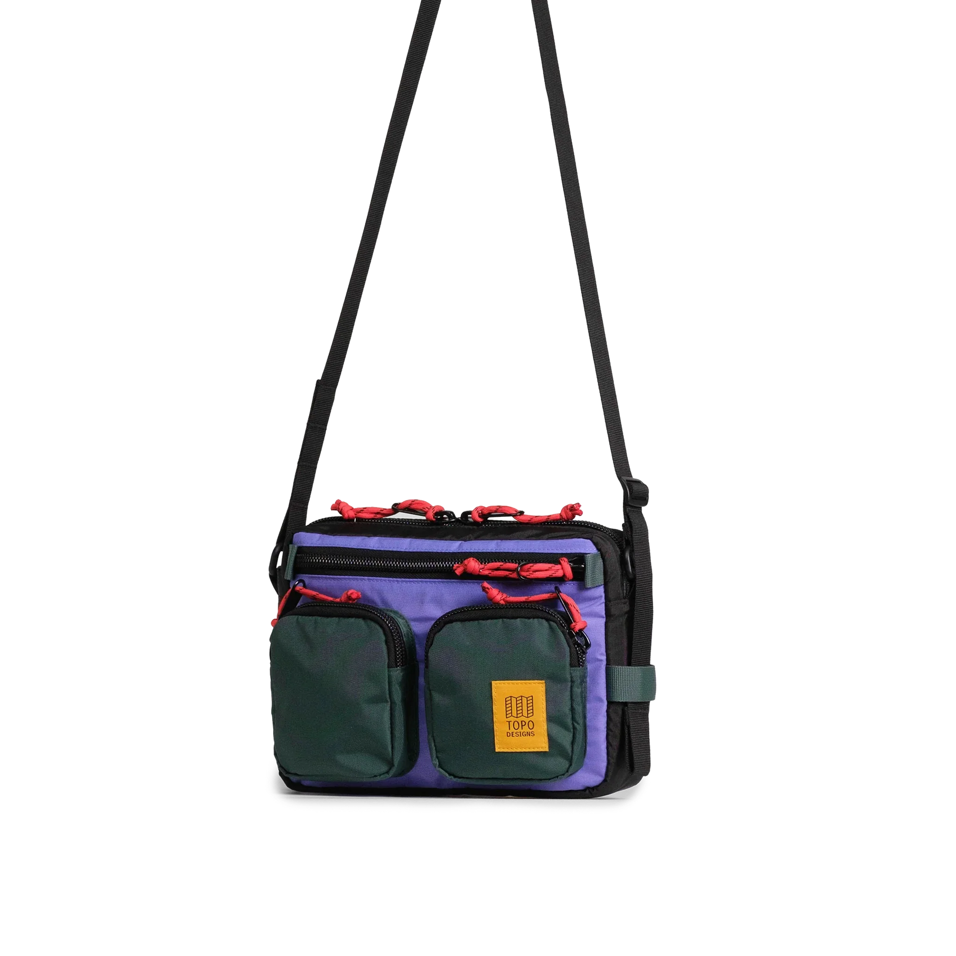 Front quarter view of Topo Designs Block Bag in "Very Peri / Forest"