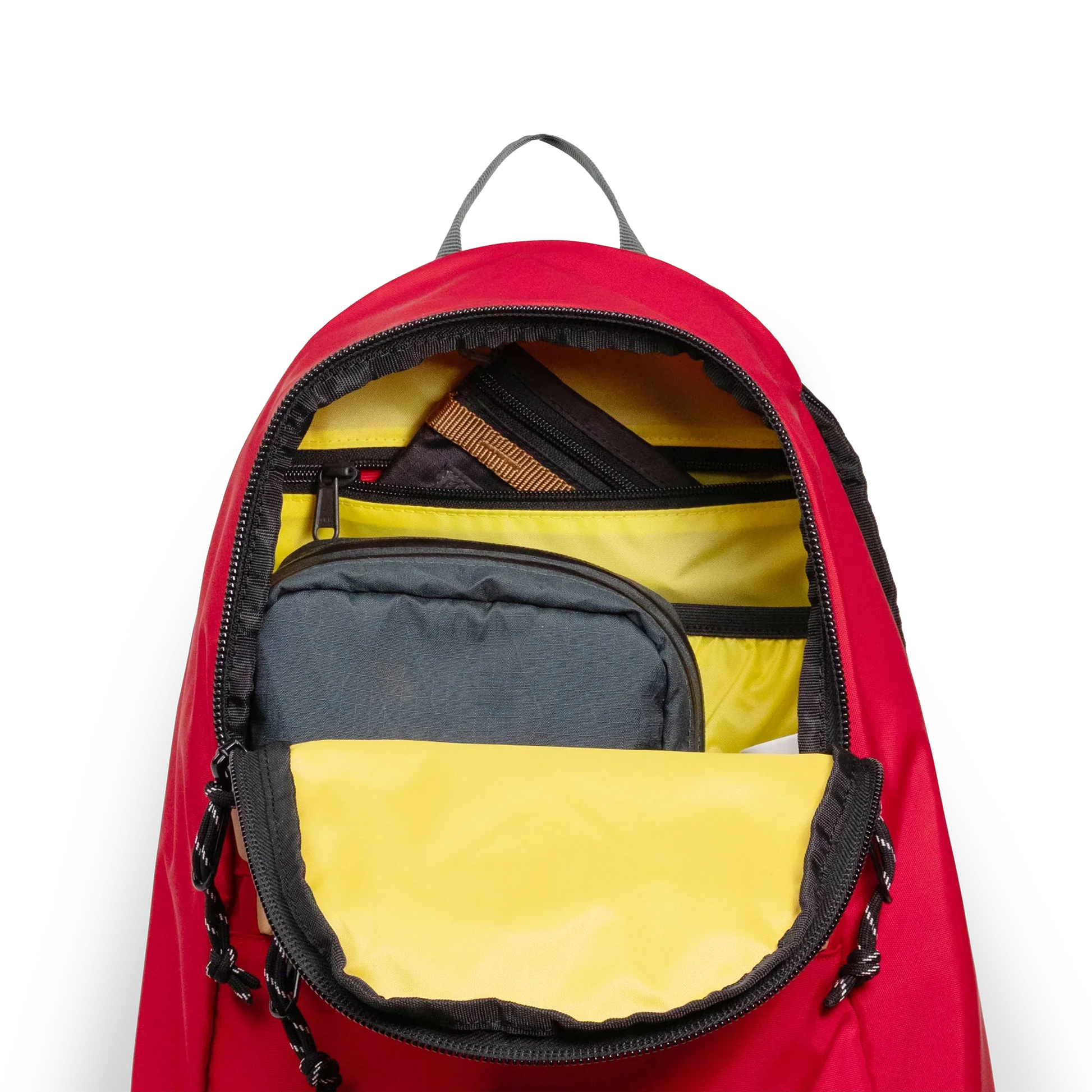 General detail view of Topo Designs Classic Teardrop Backpack in "Salsa" with the main compartment opened.
