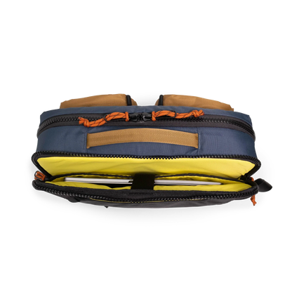 General detail product shot of the global briefcase in "Olive / Dark Khaki" showing the main compartment pockets.