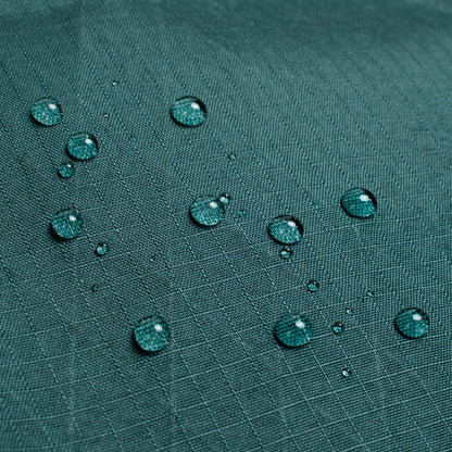General shot of Topo Designs Global Pro Backpack showing detail shot of water droplets on waterproof material
