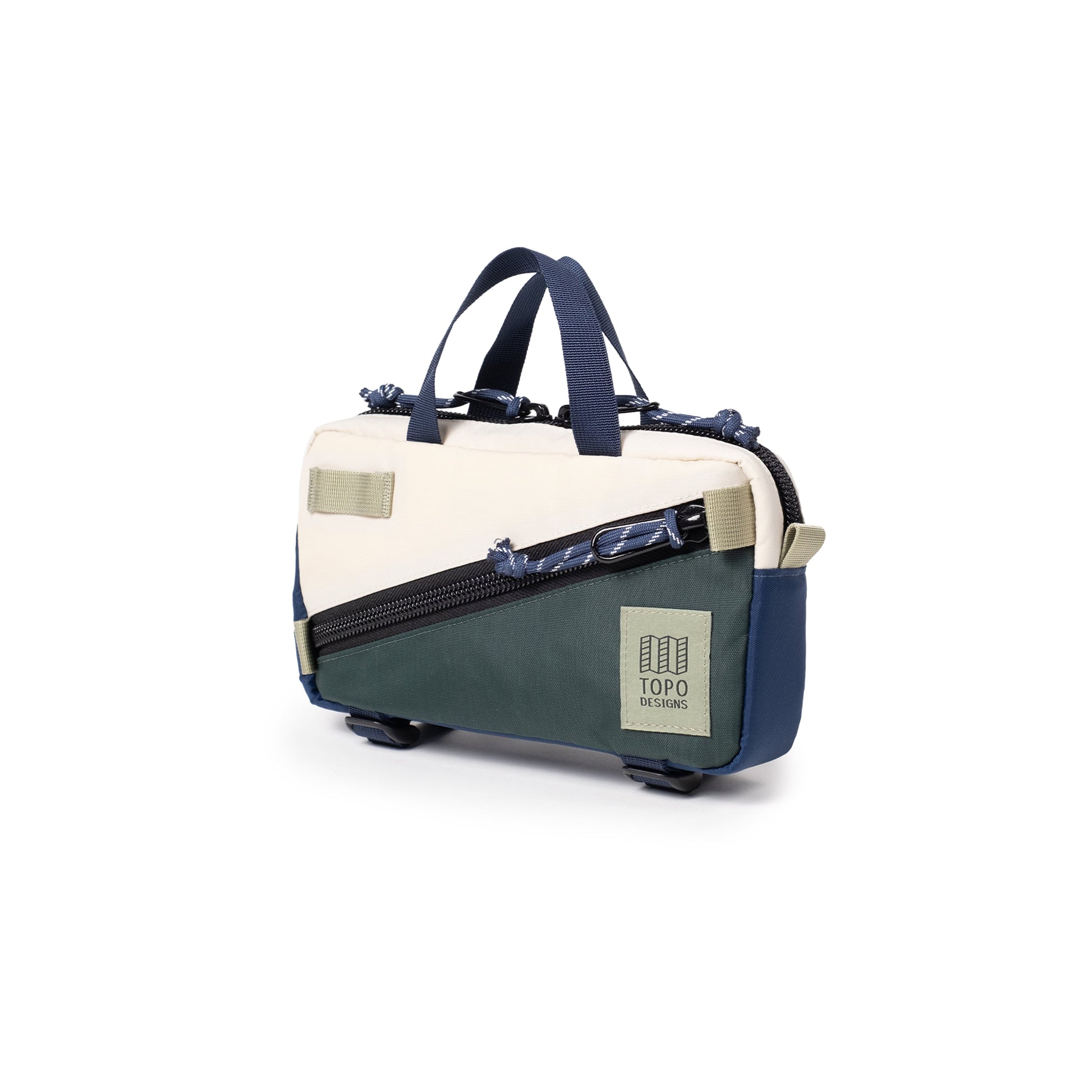 Quarter View of Topo Designs Mini Quick Pack in "Forest / Bone White"