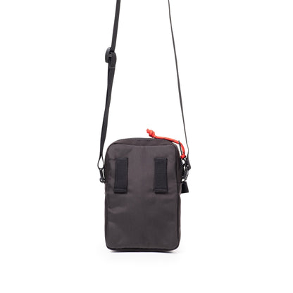 Back View of Topo Designs Mini Shoulder Bag in "Black / White Grid"