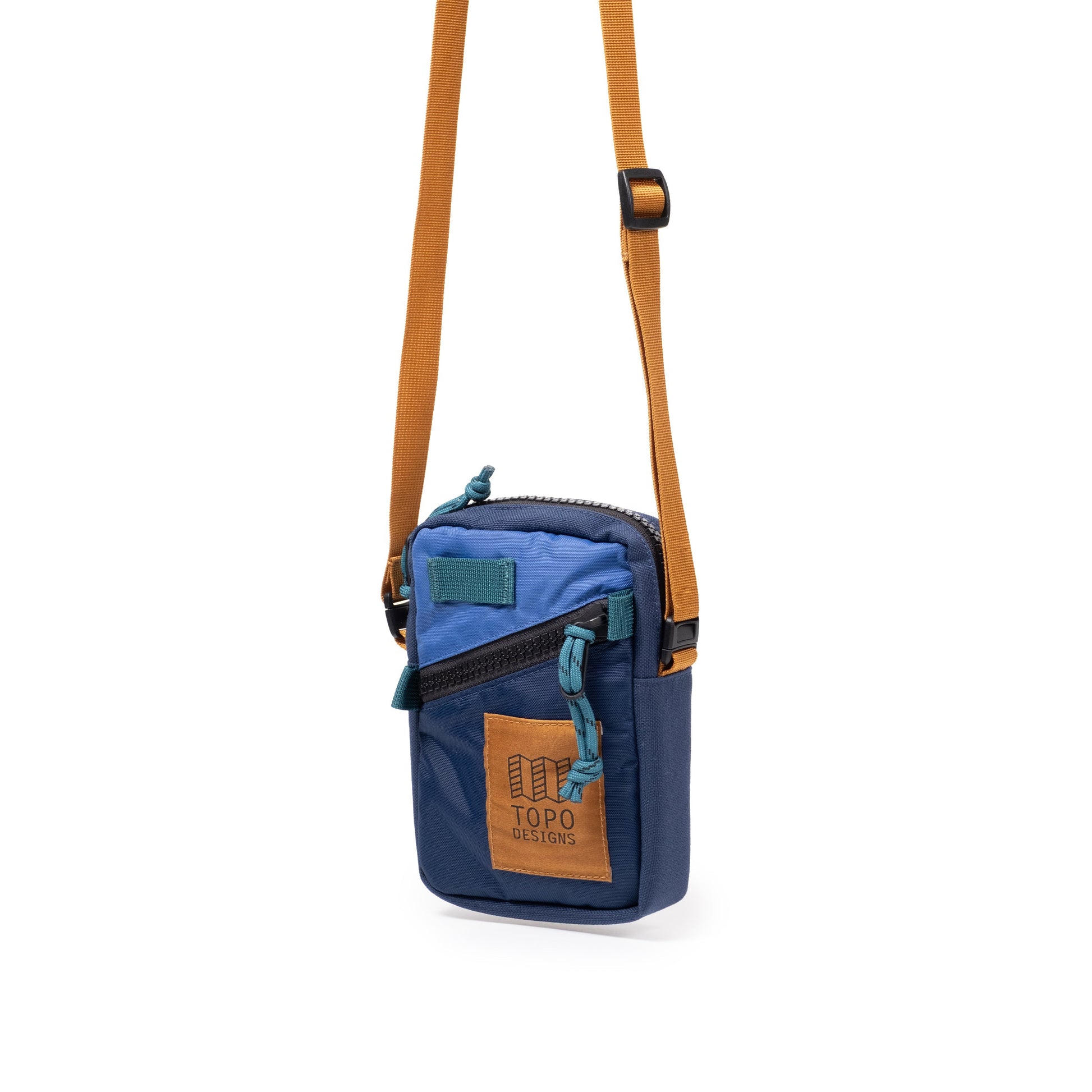 Front Quarter View of Topo Designs Mini Shoulder Bag in "Cobalt / Midnight"