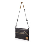 Quarter View of Topo Designs Mountain Accessory Shoulder Bag in "Black / Neutral"