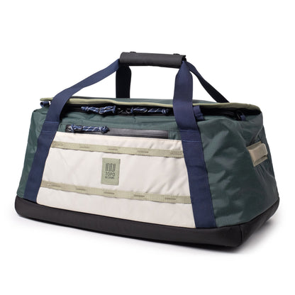 Quarter View of Topo Designs Mountain Duffel 40L in "Forest / Bone White"