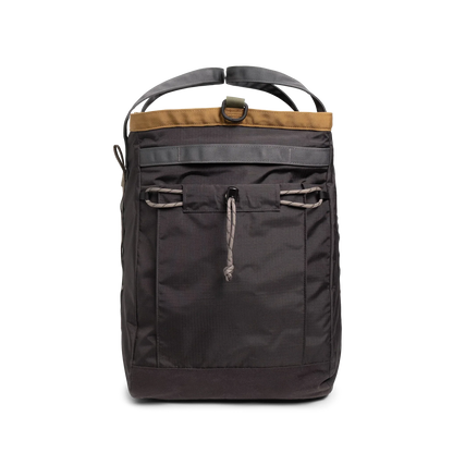 General detail shot of Topo Designs Mountain Gear Bag in "Black / Neutral" showing side pocket view.