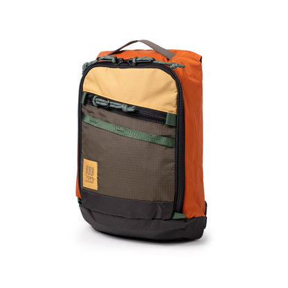 Quarter View of Topo Designs Mountain Sling Bag in "Woodland / Terracotta"