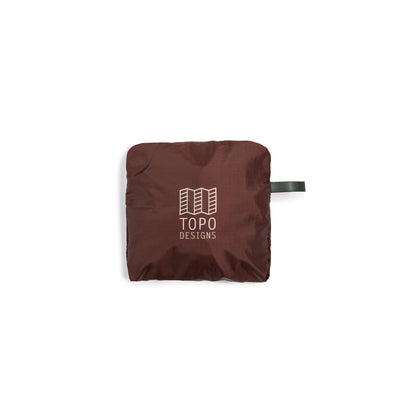 Shot of Topo Designs Packable Tote in "Desert Palm" packed in bag