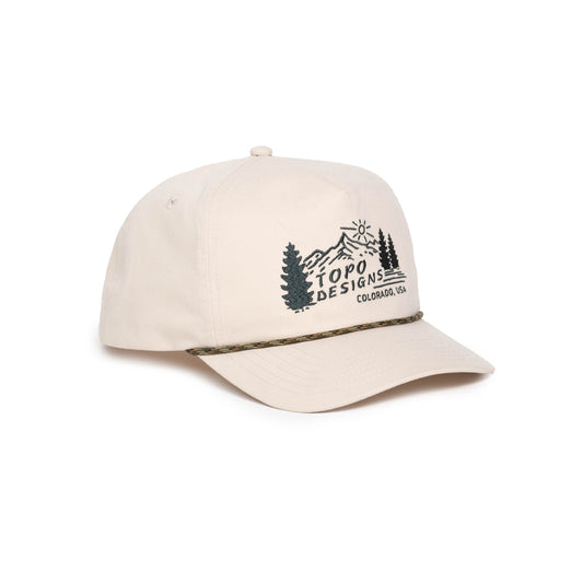Front quarter white background image of Topo Designs Twill Rope Cap - Mountain Scene in "Bone White"