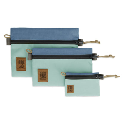 Topo Designs Accessory Bags - product shot of the "Medium", "Small", and "Micro" accessory bags in "Stone Blue / Ash Green"