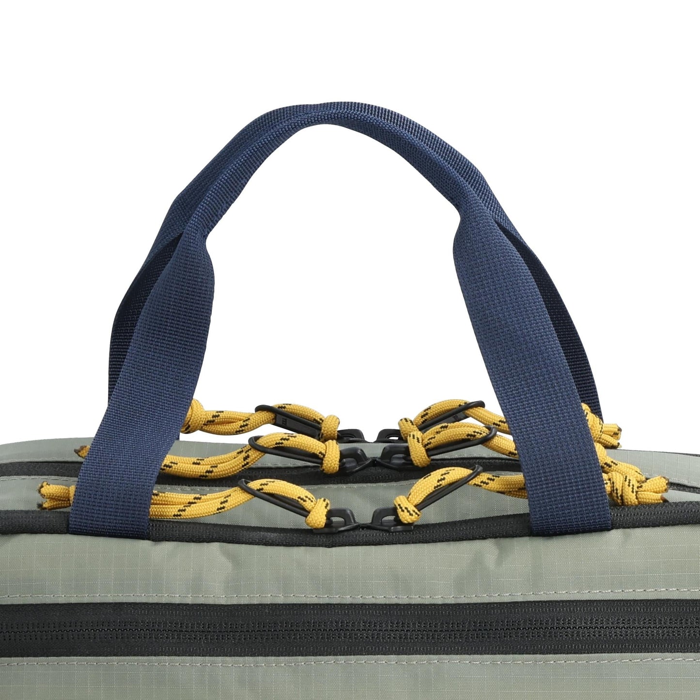 General Detail shot of Topo Designs Mountain Cross Bag in "Beetle / Khaki"