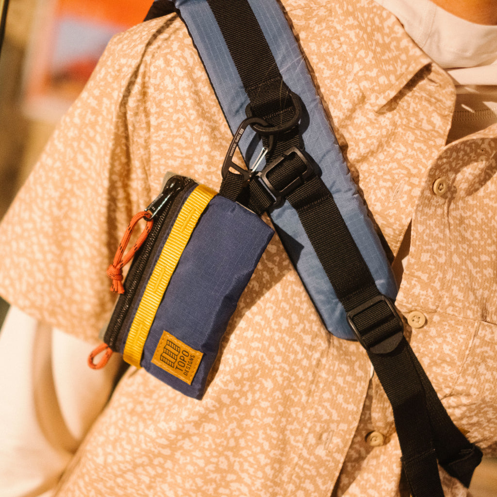 General lookbook image of Mountain Accessory Bag in "Beetle / Midnight"