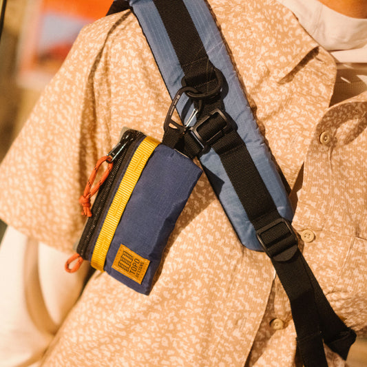 General lookbook image of Mountain Accessory Bag in "Beetle / Midnight"