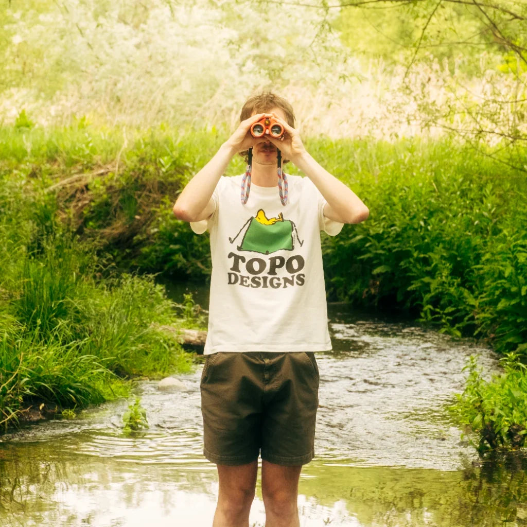 General lifestyle image of Topo Designs x TSPTR Tent Tee in "White"
