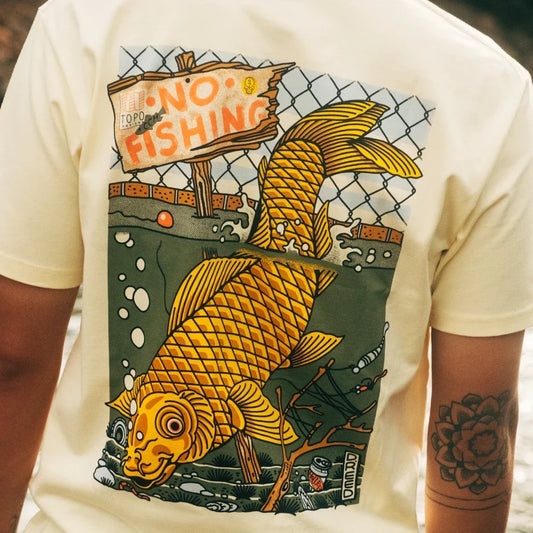 Lifestyle shot of Topo Designs x CCH x Pine Printshop Urban Angler Tee in "Butter"